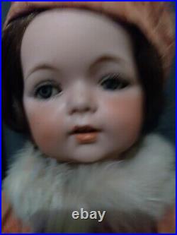 16 Charming Antique sweet faced character bebe. Bisque doll