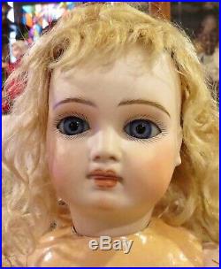 17 Antique Sonneberg Bisque Closed Mouth Doll with Musical Hand-wind Device