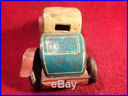 1920-s ANTIQUE VINTAGE WIND UP TIN TOY CAR DUNLOP CORD MADE IN GERMANY GERMAN