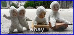 3 Antique German Bisque Snow Baby Hertwig Tumblers on Bisque Sleds