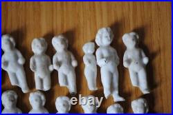 42 tiny antique german frozen charlotte dolls