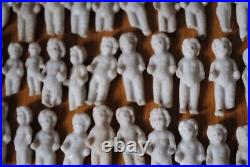 42 tiny antique german frozen charlotte dolls