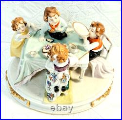 #7 Figurine Antique German Large Oval Base 6 Tall 4 Children at the Table