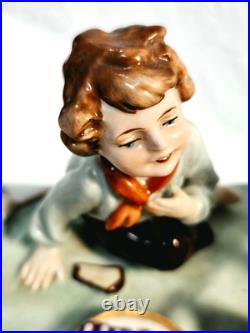#7 Figurine Antique German Large Oval Base 6 Tall 4 Children at the Table