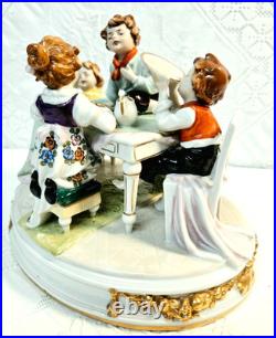 #7 Figurine Antique German Large Oval Base 6 Tall 4 Children at the Table