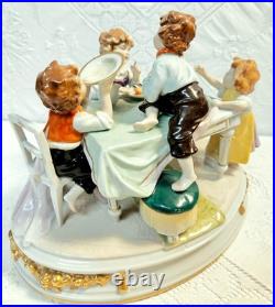 #7 Figurine Antique German Large Oval Base 6 Tall 4 Children at the Table