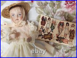 A. M 390 bisque head doll, German circa 1910/ With Doll / Antique Fur Dog/ Book A. M 390 bisque head doll, German circa 1910/ With Doll / Antique Fur Dog/ Book