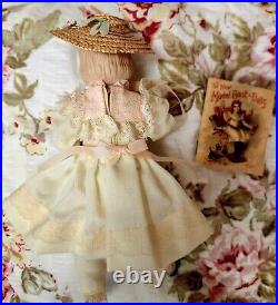 A. M 390 bisque head doll, German circa 1910/ With Doll / Antique Fur Dog/ Book A. M 390 bisque head doll, German circa 1910/ With Doll / Antique Fur Dog/ Book
