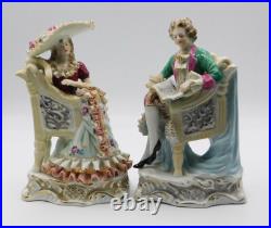 A Pair Vintage Antique German Porcelain Figurines of a Young Couple with Chairs
