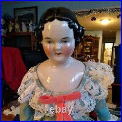 Antique 23 Inch German China Head Doll Ceramic Top Cloth Body 1850s Collectible