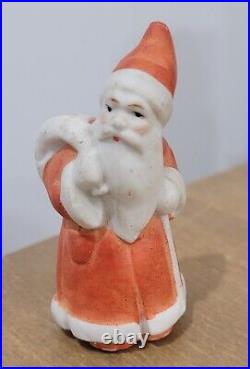 Antique All Bisque German Santa Carrying Bag Miniature