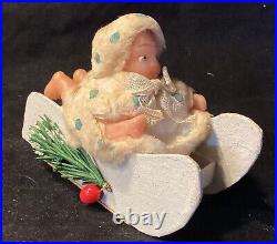 Antique Christmas German Wax child on Sled Candy Container