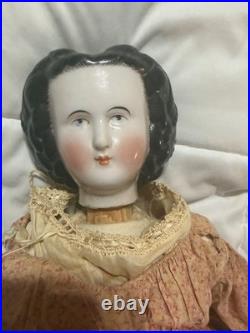 Antique German 22 inch China Doll with damage, as is