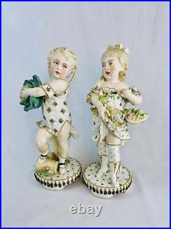 Antique German All Bisque Figurines Boy & Girl Carrying Flowers 12 Tall