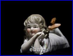 Antique German Bisque Baby Girl Laying Piano Baby Figurine Sculpture