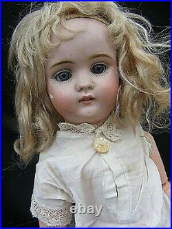 Antique German Bisque Head Doll With Wooden Limbs