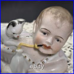 Antique German Bisque Piano Baby with Playful Kitten Victorian-era Baby Bottle
