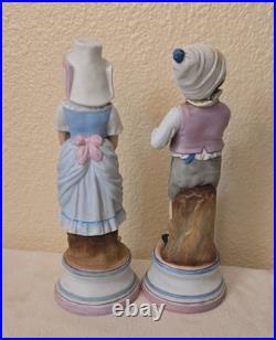 Antique German Bisque Porcelain Figures, 19th century boy and girl, Mold# 39