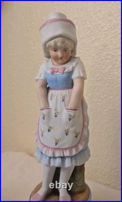 Antique German Bisque Porcelain Figures, 19th century boy and girl, Mold# 39