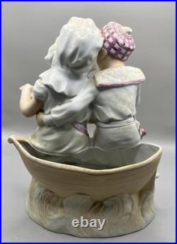 Antique German Bisque Porcelain Figurine Pair Vase Sitting on A Boat Reading