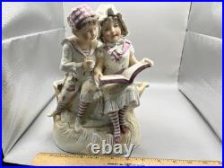Antique German Bisque Porcelain Figurine Pair Vase Sitting on A Boat Reading
