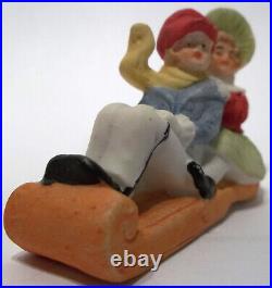 Antique German Bisque Victorian Children on Christmas Sled Belsnickle Snowbaby