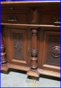 Antique German Carved Buffet Cabinet With Lion Faces