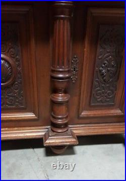 Antique German Carved Buffet Cabinet With Lion Faces