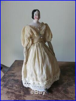 Antique German China Head Doll Bun Head 1840's with Wood Limbs Muslin Body