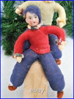Antique German Heubach Christmas 2 Cotton Batting Bisque Face Boys on Sled