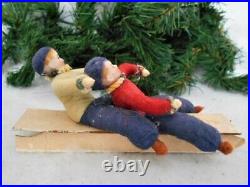 Antique German Heubach Christmas 2 Cotton Batting Bisque Face Boys on Sled
