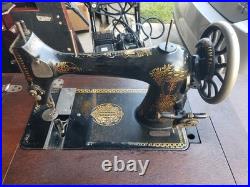 Antique German Made Sewing Machine And Cabinet