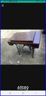 Antique German Made Sewing Machine And Cabinet