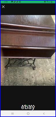 Antique German Made Sewing Machine And Cabinet