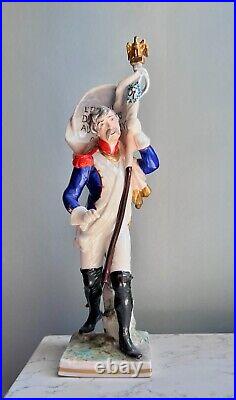 Antique German Porcelain Figurine of a French Imperial Soldier with Banner Antique German Porcelain Figurine of a French Imperial Soldier with Banner