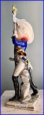 Antique German Porcelain Figurine of a French Imperial Soldier with Banner Antique German Porcelain Figurine of a French Imperial Soldier with Banner