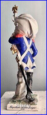 Antique German Porcelain Figurine of a French Imperial Soldier with Banner Antique German Porcelain Figurine of a French Imperial Soldier with Banner