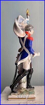 Antique German Porcelain Figurine of a French Imperial Soldier with Banner Antique German Porcelain Figurine of a French Imperial Soldier with Banner