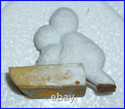 Antique German SnowBaby pushing Baby on Sled Snow Bisque