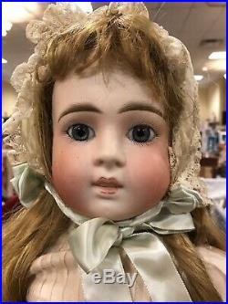 Antique Sonneberg bebe 136 doll on Jumeau body. Gorgeous wig