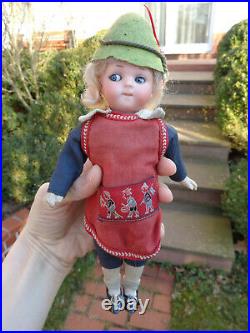 Antique doll rare googly doll with closed mouth original dress