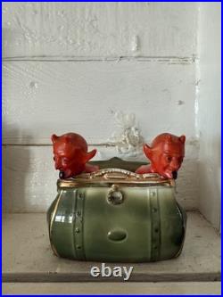 Antique early 1900s German fairing Red Devils in Purse figure, porcelain, RARE