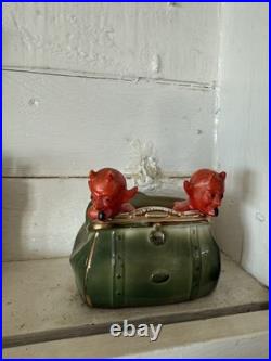 Antique early 1900s German fairing Red Devils in Purse figure, porcelain, RARE