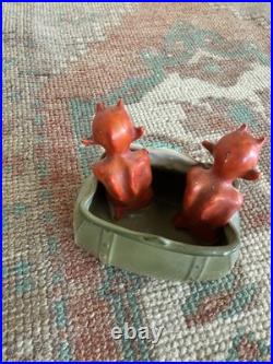 Antique early 1900s German fairing Red Devils in Purse figure, porcelain, RARE