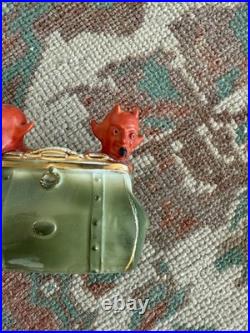 Antique early 1900s German fairing Red Devils in Purse figure, porcelain, RARE