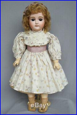 Antique early Kestner pouty doll with 8 ball jointed straight wrist body