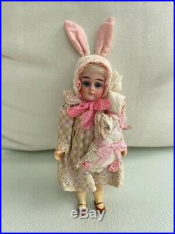 Antique porcelain head doll K & R Bunny mom with Baby