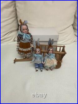 Antique set with 3 rabbits and wooden handcart