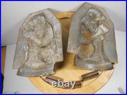 Antique vintage German metal chocolate mold with clamps sitting bear on tree trunk