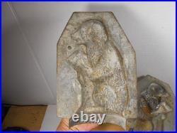 Antique vintage German metal chocolate mold with clamps sitting bear on tree trunk